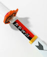 Anime cosplay katana with orange guard, white handle, and Japanese text on the red blade
