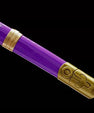 Purple anime katana scabbard with gold accents and floral emblem on black background