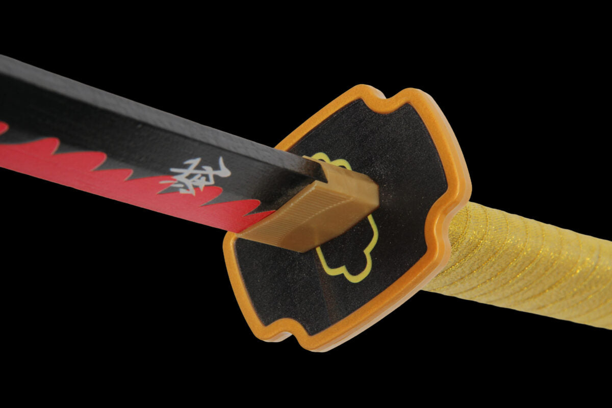Close-up of anime katana with black blade, red pattern, and decorative yellow handle