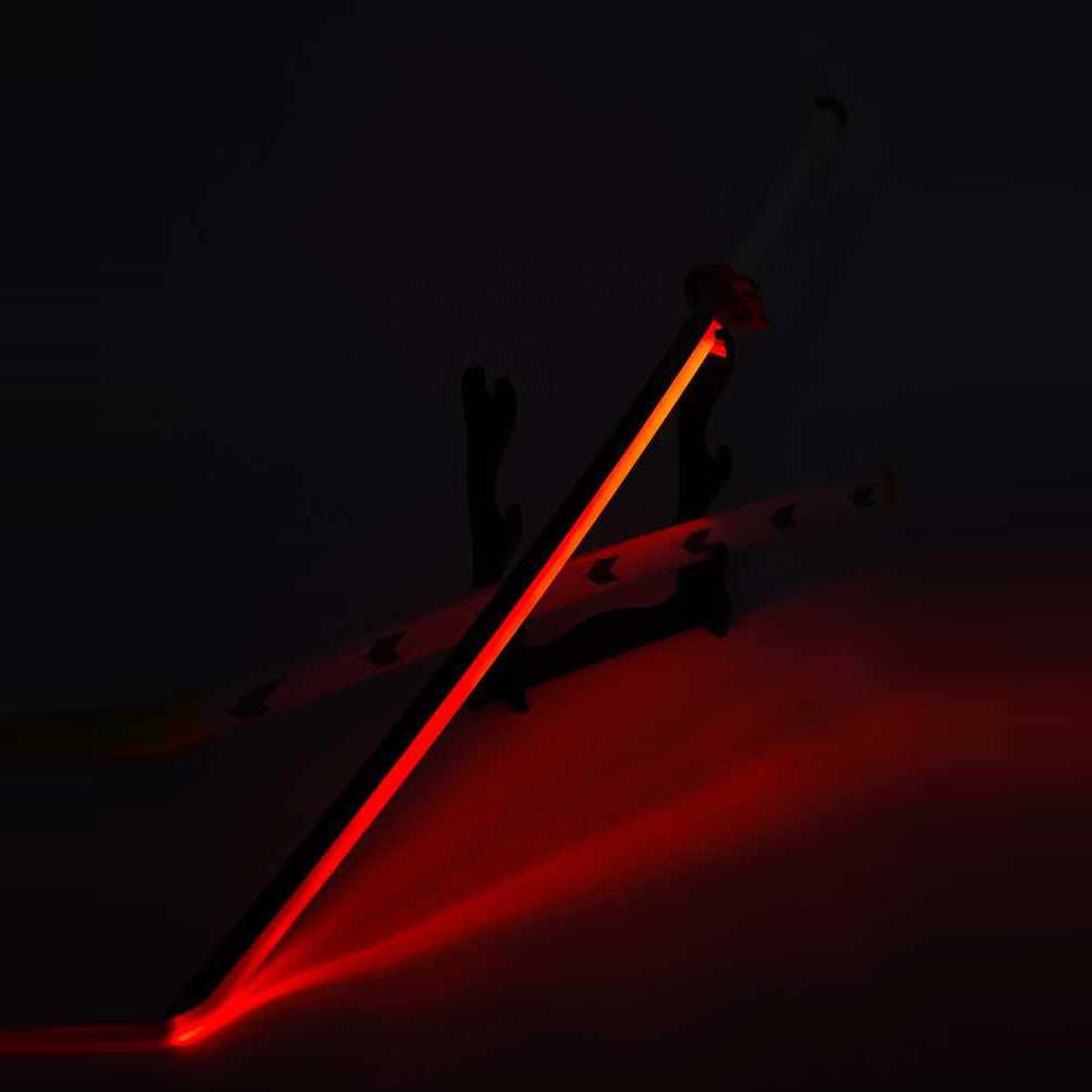 LED katana sword with glowing red blade on display stand in dark setting